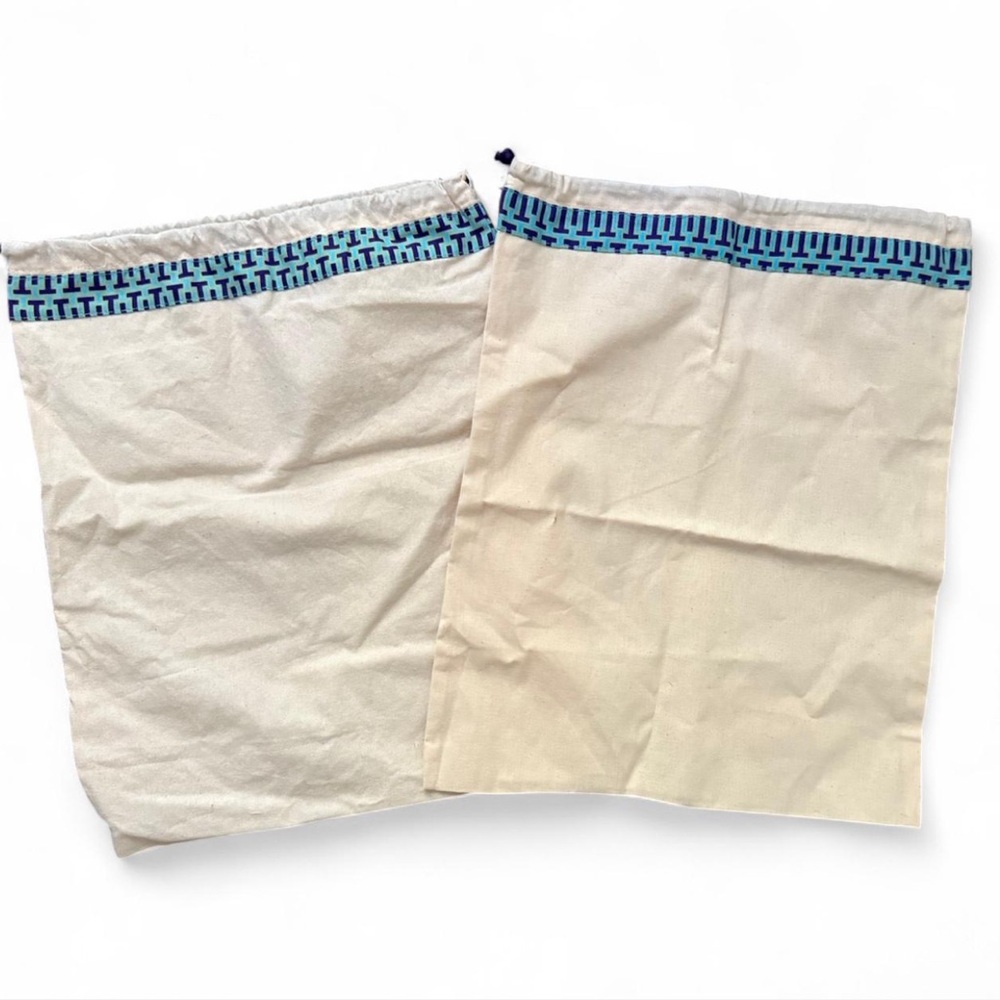 TORY BURCH set of 2 dust covers. Each would fit a pair of shoes or small bag.